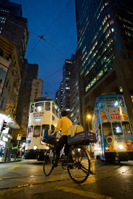 Risky Bike Ride Among Trams