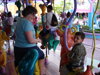 Riding the merry-go-round with Grandma