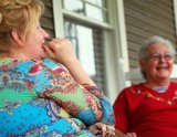 donna laughs at crechies story