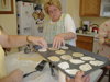 Sliding the dough onto the pan takes a delicate hand