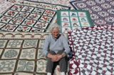 Mom and her quilts